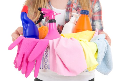 Professional cleaner beginning a West Hampstead home cleaning session
