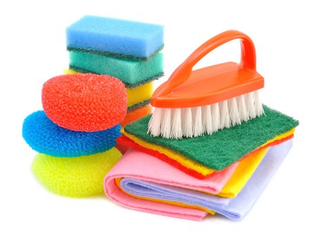 Westhampstead cleaner wearing PPE while sanitising surfaces